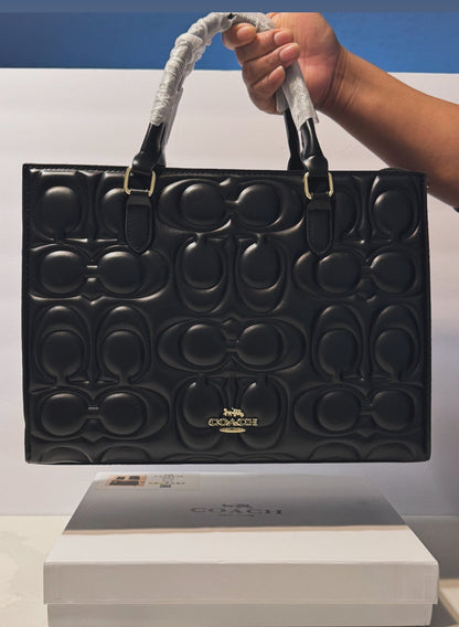 Bolsa inspirada por Coach